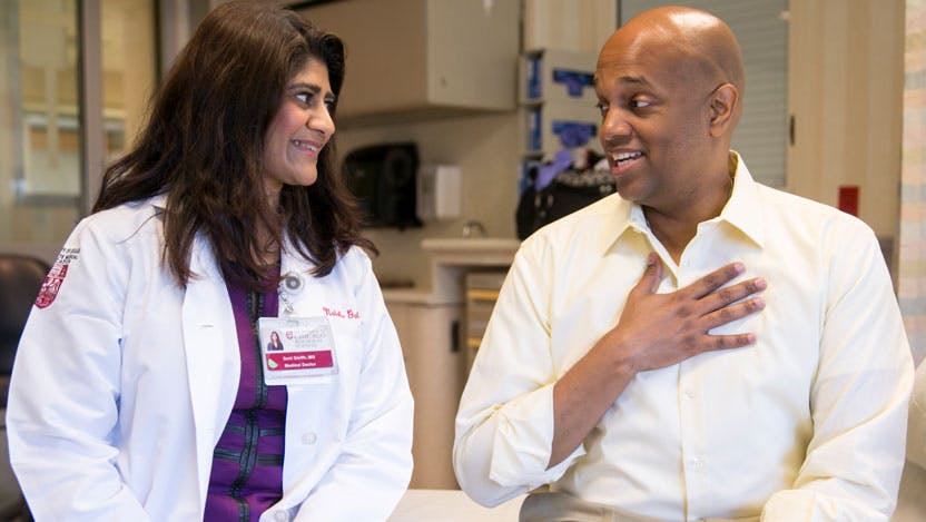 Medical oncologist Sonali Smith, MD, and lymphoma patient Clayton Harris
