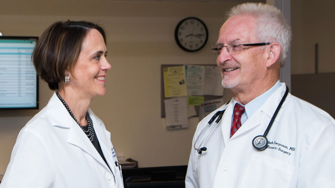 Thoracic surgeons Jessica Donington, MD, and Mark Ferguson, MD