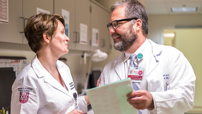Neil Hyman, MD, and female resident