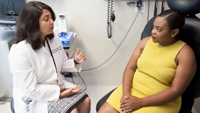 Gynecologic oncologist Nita Lee, MD, with a patient