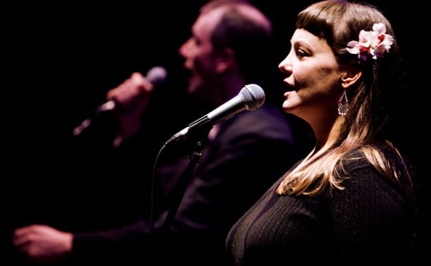 Female and male professional singers performing
