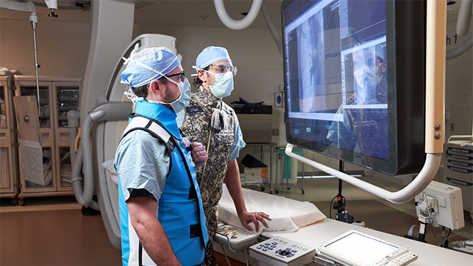 Drs. Ahmed and Paul diagnosis patient