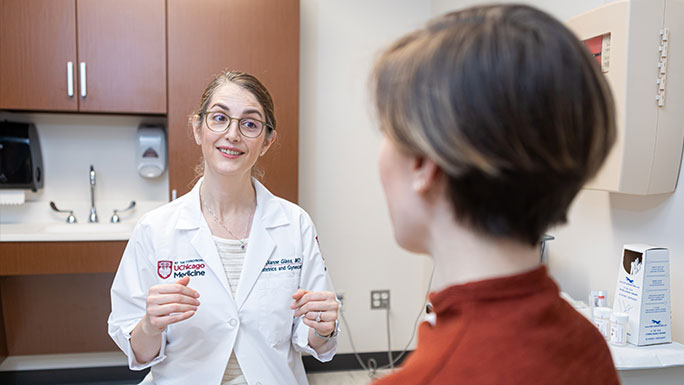 Urogynecologist Dianne Glass, MD, PhD, consults with a patient seeking treatment for a pelvic floor condition