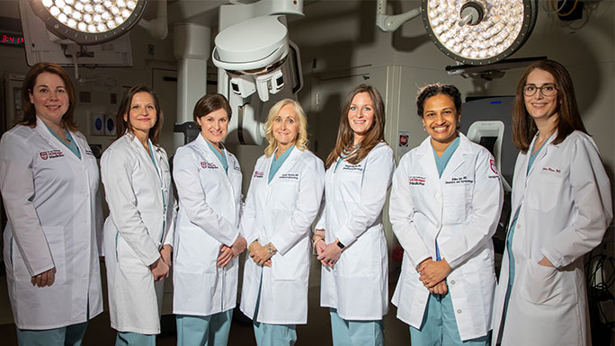Urogynecologists in the OR where they perform pelvic surgery procedures