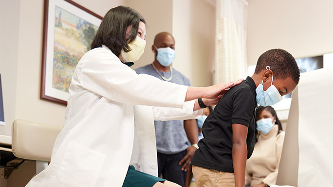 Dr. DeVries and patient