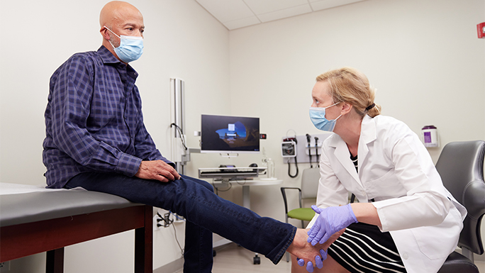 Dr. Hynes and foot patient