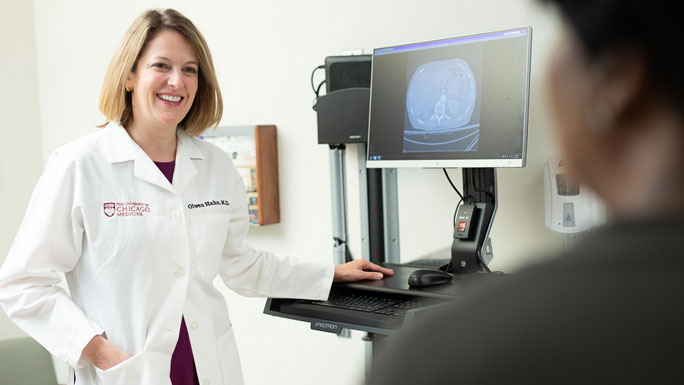 Olwen Hahn, MD, with patient