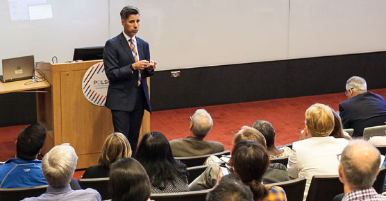 Sam Volchenboum, MD, PhD, MS, speaking at a conference