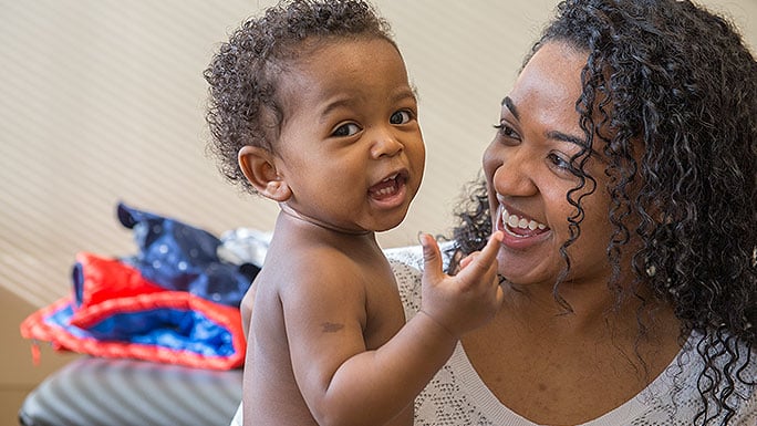 Young patient with mom during pediatrician visit at Comer Children's Hospital in Chicago