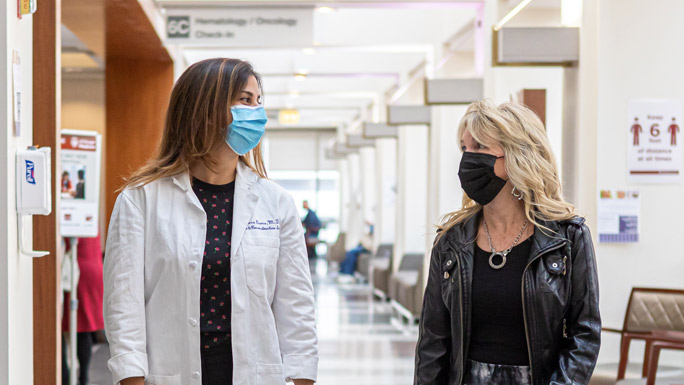 plastic surgeon Rebecca Garza, MD, and breast cancer survivor Pam Herber