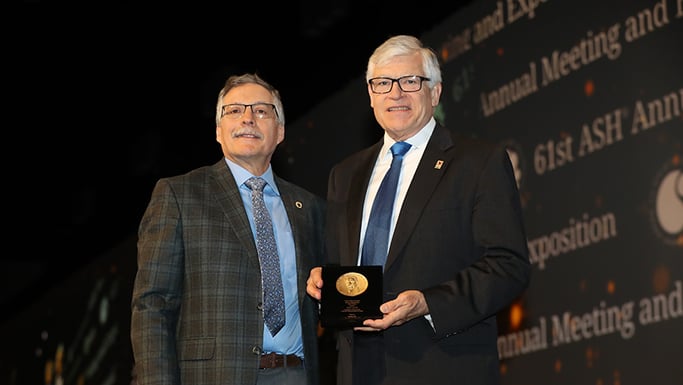 Richard Larson receiving award