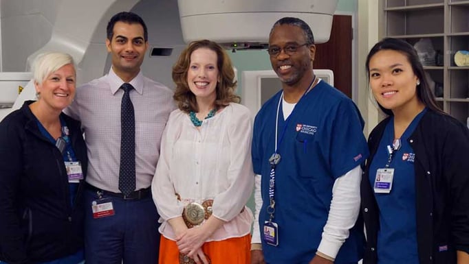 Theresa Barrett, center, and her treatment team
