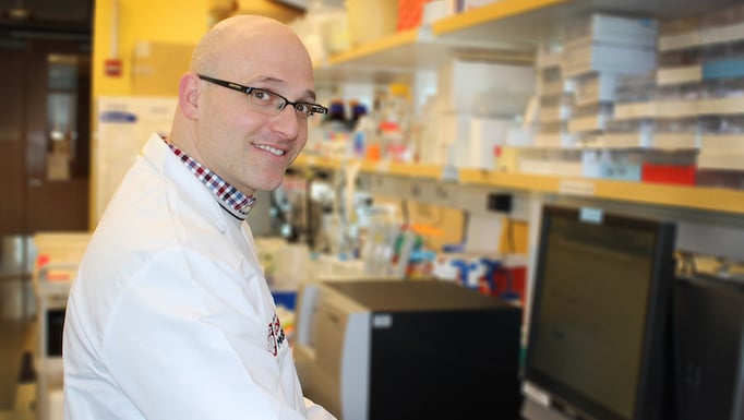 Associate Professor of Medicine Daniel Catenacci, MD, in his laboratory