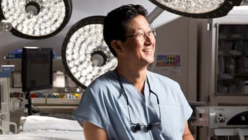 David Chang, MD, lymphedema surgery expert, portrait in surgical suite