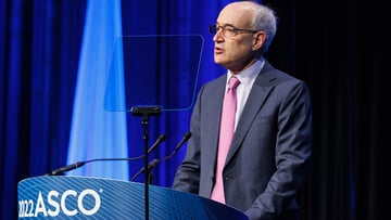 Image of Dr. Everett Vokes talking at ASCO meeting