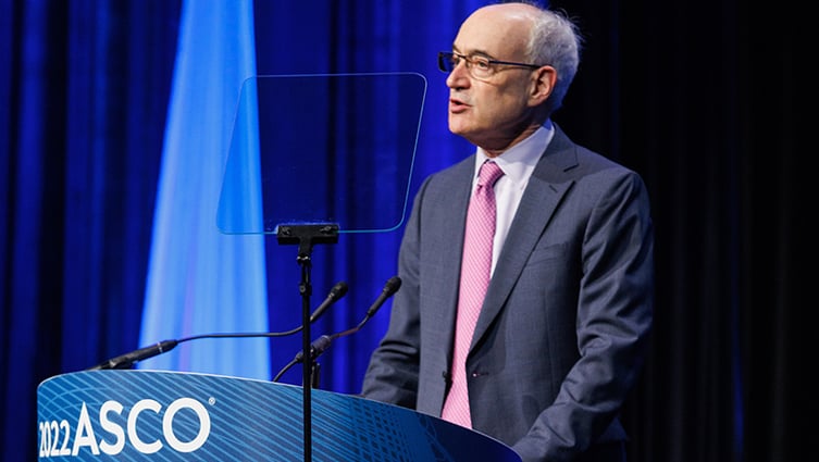 Image of Dr. Everett Vokes talking at ASCO meeting