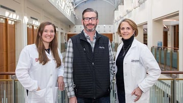 Patient John Polo with oncologist Christine Bestvina, MD, left, and surgeon Jessica Donington, MD.