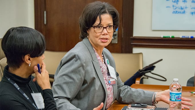 Brenda Battle, MBA, BSN, RN, speaking during a meeting