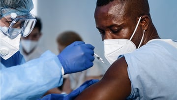 stock patient getting vaccine shot