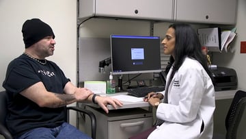 GERD patient Michael Meadows talks with Dr. Vigneswaran about anti-reflux surgery