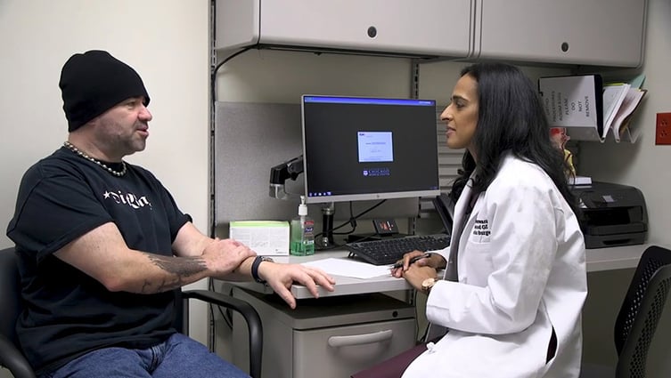 GERD patient Michael Meadows talks with Dr. Vigneswaran about anti-reflux surgery