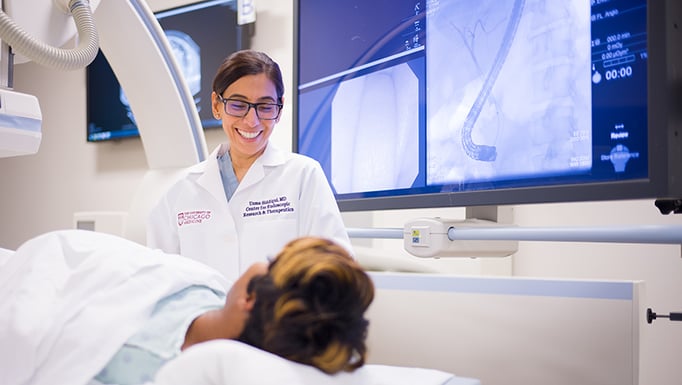 Uzma Siddiqui, MD, with a patient