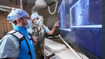 Drs. Ahmed and Paul review scan