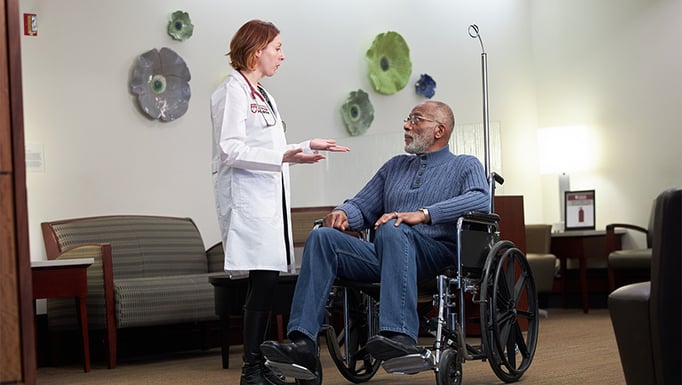 Sara Kalantari and pateint in wheelchair universal