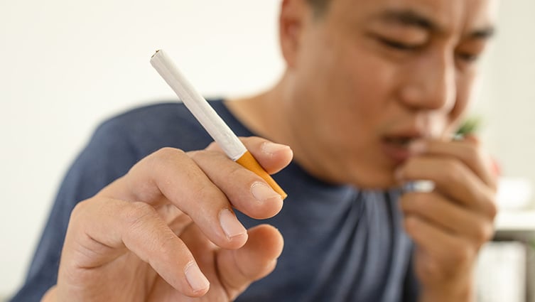 Adult man smoking