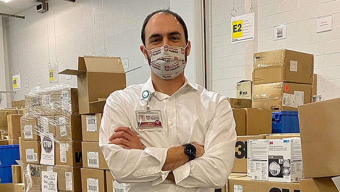 Eric Tritch standing in the warehouse