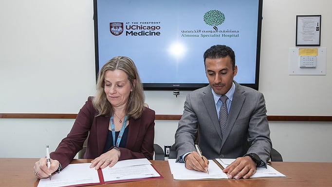 Signing the agreement.