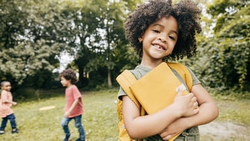 Image of girl getting ready to go to school