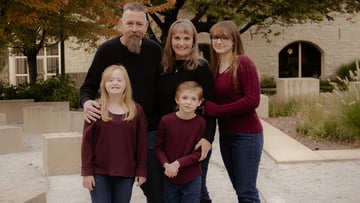 Image of pediatric neurosurgery patient Joseph Riofski (center right) and his family