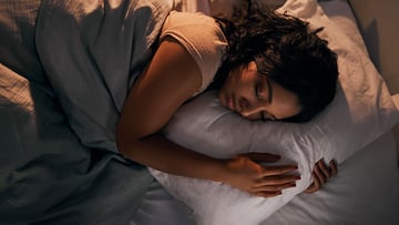 Woman sleeping in bed