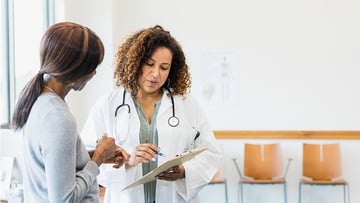 Image of doctor talking about medical results to a patient