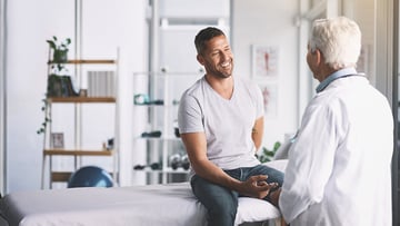 Cropped shot of a senior doctor giving his male patient a thorough checkup during his consultation