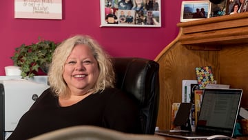 Pelvic surgery patient Lisa Welz at her desk