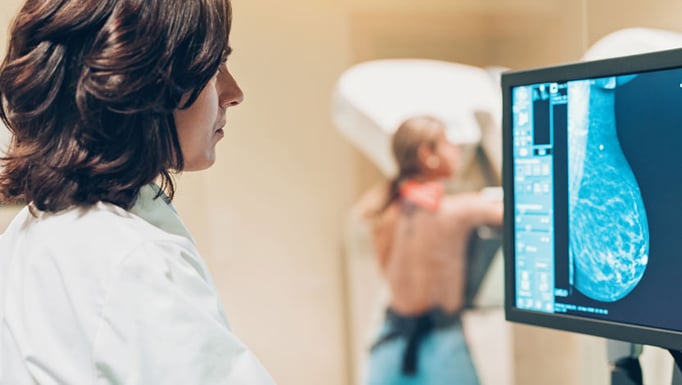 woman getting a mammogram