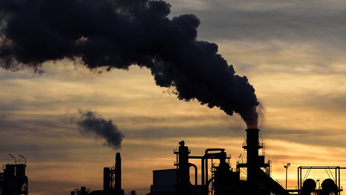 A factory spewing smoke