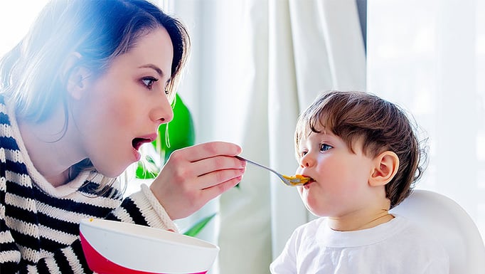 Mom feeding baby
