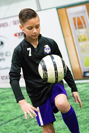 Luke warming up for a soccer game