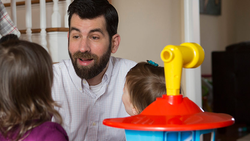 Brad Goodman with his two young children