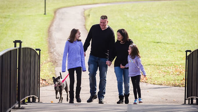 The Brodzik family walking together, Christina Brodzik