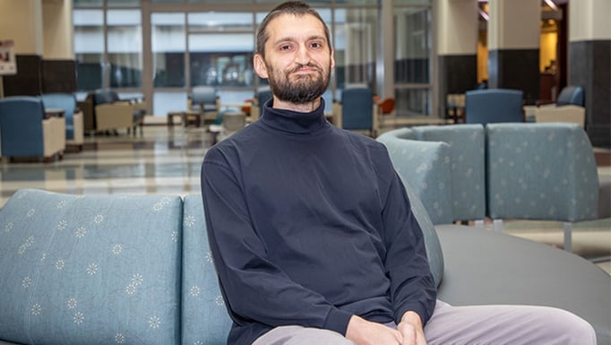 Dmitry Karpeyev, PhD, survived a dangerous cancerous tumor behind his face; now he
