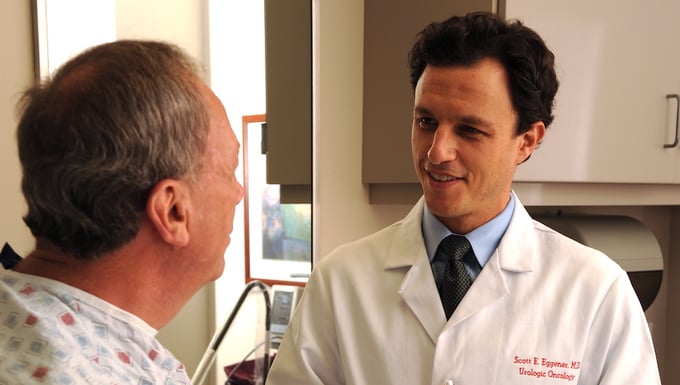 Scott Eggener with a patient
