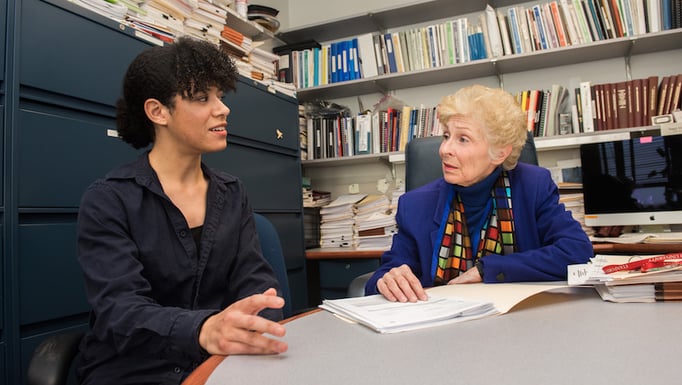 GRIT co-founder Christina Roman meets with faculty advisor Nancy Schwartz, PhD, dean and director of postdoctoral a airs.