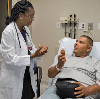Olatoyosi Odenike, MD, and patient
