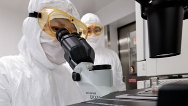 two staff members in Advanced Cellular Therapeutics Facility (ACTF)