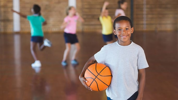 Boy holding basketball
