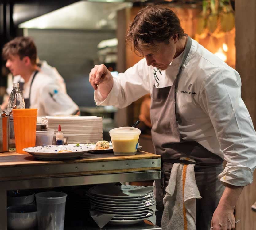 Chef Grant Achatz, head and neck cancer survivor, at work in the kitchen at Roister.